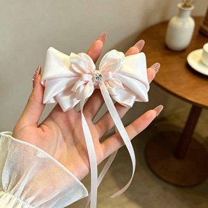 A super cute orchid flower hair <b>clip</b> with a resort vibe, perfect for elegant bangs and a sweet new hair accessory to match your - Product Image 3