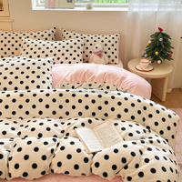 Ensemble de literie quatre pièces en polyester à pois noir classique avec housse de couette