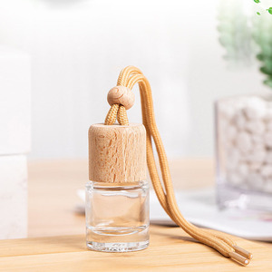 Perfume de aromaterapia para coche de 8ml, botella vacía dividida, botella volátil, decoración de salida de coche, fragancia de coche encantadora de dibujos animados con tapa de madera - Product Image 2