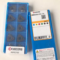 XWNMG080412PS-TTB CA4515 Kyoceras OEM Plaquitas de Carburo para Torno CNC, Hoja de 32mm, Espesor de 2.0mm, Diámetro del Orificio de 18mm, Recubrimiento CVD