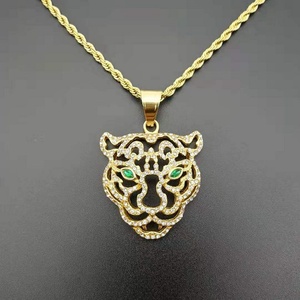 Free Sample Hiphop Style Green Eye Hollow Lion Head <b>Animal</b> Gold Plated Stainless Steel Pendant <b>Crystal</b> Rhinestone Claw Setting - Product Image 1