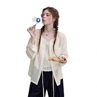 Cardigan d'été Letm style anglais en jacquard ajouré tricoté, à col rond, manches longues, coupe régulière, uni, avec détails boutonnés et découpes, ajustable