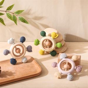 Venta al por mayor <span class=keywords><strong>de</strong></span> fábrica, juguetes <span class=keywords><strong>para</strong></span> la dentición del bebé, mordedores <span class=keywords><strong>de</strong></span> silicona, timón <span class=keywords><strong>de</strong></span> silicona <span class=keywords><strong>de</strong></span> grado alimenticio con anillo <span class=keywords><strong>de</strong></span> madera, calmar las encías <span class=keywords><strong>de</strong></span> los bebés - Product Image 2