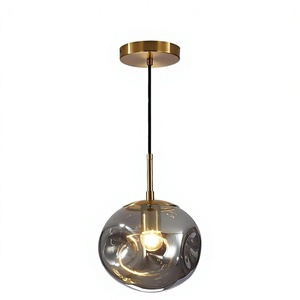 Luminaire suspendu Yelbes Mid Century Modern Gold Globe avec verre gris fumé 9,8 pouces pour îlot de cuisine - Product Image 1