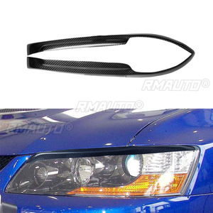1 paire de couvre-phares de voiture en fibre de carbone véritable, garnitures pour Mitsubishi EVO7-9 2003-2007, accessoires de voiture - Product Image 1