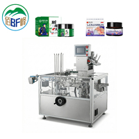 Machine d'emballage automatique compacte et efficace pour pots de crème et baume, avec contrôle par écran tactile PLC