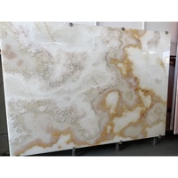 Panneau mural d'onyx translucide assorti au livre, décoration de revêtement de panneau, veines Orange jaunes, dalle de marbre d'onyx blanc