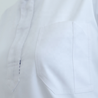 Uniforme médical unisexe blanc à col montant et manches courtes, design soigné et confortable, pour détection par détecteur de métaux, vente en gros, pour hôpitaux européens