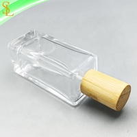 Flacon de parfum élégant rectangulaire vide de 50 ml (1,7 oz) pour femme, flacon en verre vaporisateur de 30 ml pour parfum avec couvercle en bambou