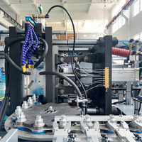 Machine de soufflage à 4 cavités 2L entièrement automatique à servomoteur 4500BPH infrarouge pour préformes d'eau minérale et de jus