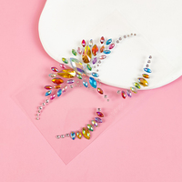 Autocollants de tatouage en strass pour le visage, vente en gros d'usine personnalisée, décoration amusante pour les yeux, autocollants de pierres précieuses en strass pour le corps, art corporel sexy