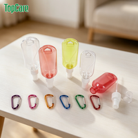 Vente en gros de flacons pulvérisateurs en plastique de 30 ml, 50 ml, 60 ml, porte-clés, vaporisateur de désinfectant pour les mains portable pour les voyages, avec mousqueton, logo personnalisé
