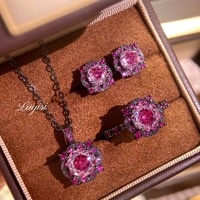 Ensemble de bijoux fantaisie pour femme : Collier pendentif bleu marine à huit points taillés en forme de rose, boucles d'oreilles rondes en cuivre plaqué or noir et bague ouverte - Vente en gros