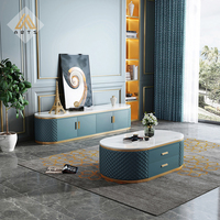 Meuble de salon de luxe de conception italienne, table TV avec plateau en marbre, pieds en acier inoxydable, support TV rembourré en cuir