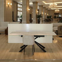 Usine chinoise vend des tables de salle à manger extensibles et réglables en verre trempé avec plateau en céramique et pieds en métal, style moderne et luxueux, pour hôtels.