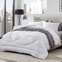 Couette matelassée réversible King Size, alternative au duvet, garnissage doux, respirante, toutes saisons, pour literie.