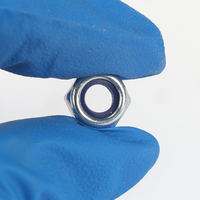 Écrou de blocage hexagonal épais en acier au carbone DIN 982 Grade 8 avec insert non métallique, zingué bleu-blanc, pour applications anti-vibrations