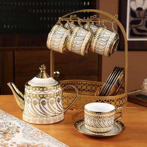 Ensemble de théière, tasses et soucoupes en céramique plaquée or de luxe pour le thé de l'après-midi avec support plaqué or, durable, portable, option de logo personnalisé - Product Image 1