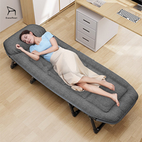 Lit pliant compact avec cadre métallique et coussin confortable pour chambre et bureau