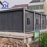 Maison conteneur préfabriquée isolée et respirante à faible coût, personnalisée par XH, pour bureau, maison, hôtel, centre commercial, parc