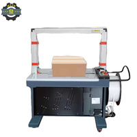 Machine de cerclage de presse à grande vitesse en PP de table basse de carton de boîte d'opération simple à vitesse rapide entièrement automatique