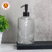 Distributeur de savon en verre transparent en spirale de 500 ml (17 oz) avec pompe noire mate pour la décoration de salle de bain d'hôtel, vente en gros