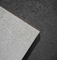 Peinture à base de pierre naturelle Crystal Stone, alliant durabilité et effet pierre texturé, revêtement intérieur pour bâtiments