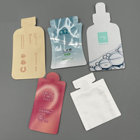 Mini pochette souple à bec verseur de forme spéciale, format échantillon, portable, anti-fuite, pour sérum de soin et emballage d'essai de produits de beauté