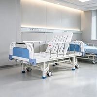 Lit d'hôpital manuel certifié CE avec freins indépendants, roulettes et barrières latérales en alliage d'aluminium pour les établissements médicaux et les soins à domicile