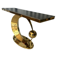 Table à manger en pierre frittée de luxe avec support en acier doré, design moderne pour la maison et l'hôtellerie