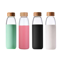 Bouteille de boisson d'eau en verre borosilicate de haute qualité de 550ml avec couvercle en bambou bouche Standard manchon en Silicone eau bouillante Applicable