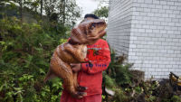 Petite marionnette animatronique dinosaure T-Rex Baby Dino