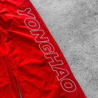 OEM ODM Maßgeschneiderte Herren Weite Hosen Nylon Wasserabweisende Baggy Loose Fit Buchstabendruck Fallschirmhosen Lässige Streetwear