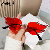 Lunettes de soleil Y2K sans monture en forme de flamme, ornées de strass, de diamants rouges de luxe, style punk, pour fêtes, collection 2026
