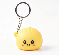 Porte-clés anti-stress mignon en forme de boulette lumineuse simulée, jouet à presser pour la décoration de sac à dos