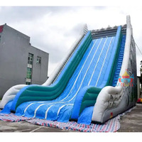 Toboggan sec géant de 42 pieds personnalisé dans le commerce Toboggan sec gonflable à thème d'hiver pour les événements de fête d'enfants