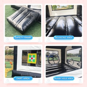 Château gonflable commercial en PVC noir et blanc avec toboggan, idéal pour la location événementielle - Product Image 3