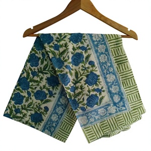 Exquisita Tela de Algodón Estampada a Mano con Vibrantes Motivos Florales Azules y Elegantes Bordes Geométricos en Verde Salvia - Product Image 1