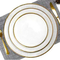 Assiettes en verre de luxe minimalistes de haute qualité, assiettes de service rondes blanches avec bord doré pour mariage
