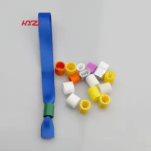 สายรัดข้อมือผ้าล็อคแบบเลื่อนทางเดียวกระดุมพลาสติกแบบใช้แล้วทิ้งพร้อมฟัน HXZY43สีตามสั่ง