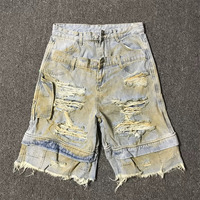 Short en jean délavé et déchiré style américain tendance 2026, coupe droite, taille mi-haute, respirant, cinq points, été