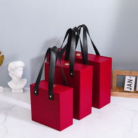 Boîte cadeau rigide portable de haute qualité pour la Saint-Valentin, emballage pour parfum, revêtement UV brillant, gaufrage, fabrication OEM