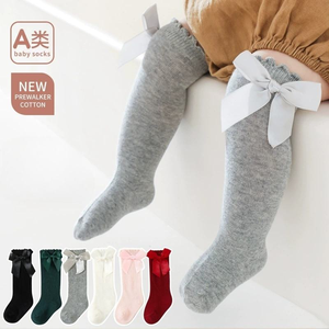 Vente en gros Chaussettes hautes colorées pour bébés filles au genou pour tout-petits Bas tube à volants avec nœud - Product Image 1