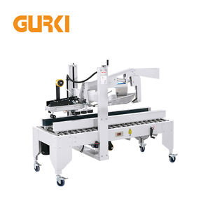 Máquina Selladora de Cajas Semiautomática Gurkipack de Fácil Operación con Plegado de Solapas para Embalaje de Textiles y Productos Químicos, con Cinta y Correa - Product Image 1