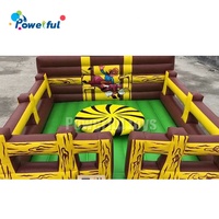 Jeu de sport gonflable interactif jeu d'essuyage tour mécanique sur roue de diables gonflables