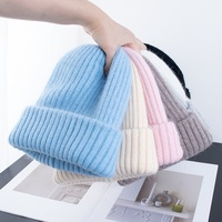 Vente en gros de bonnets en acrylique doux et épais à double couche, en fourrure de lapin, pour l'hiver, unisexes, streetwear, sport