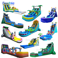 Toboggan gonflable commercial de nouvelle conception bon marché aire de jeux extérieure château plein d'entrain jardin palmier toboggan pour enfants adultes