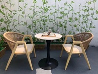 Ensemble de table et chaises en teck massif pour l'extérieur, style moderne et luxueux, avec chaise en corde et teck