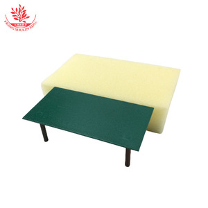 A small table with sponge blocks is used in a middle school <b>physics</b> experiment to demonstrate the relationship between the - Product Image 4