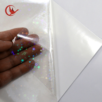 Film de lamination à froid holographique laser en rouleau, noyau en PVC souple/design étoile, protection pour photos et affiches, alimentaire BOPP